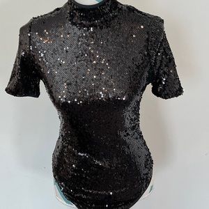 Sequins bodysuit.